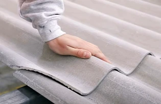 Repair of asbestos slate
